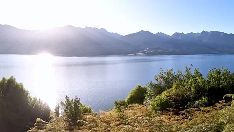 Stunning Sunset Views of Lake Hawea: A Serene Alpine Lake Surrounded by Sou.. Stock Footage 295012017