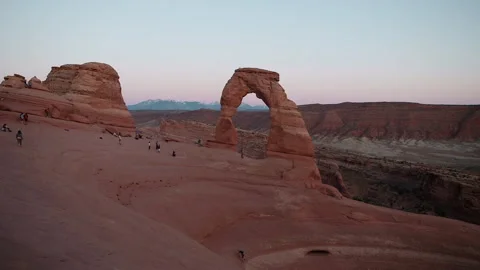 Stunning sunset views of Red Rock Arch with people enjoying the moment Stock Footage 321601627