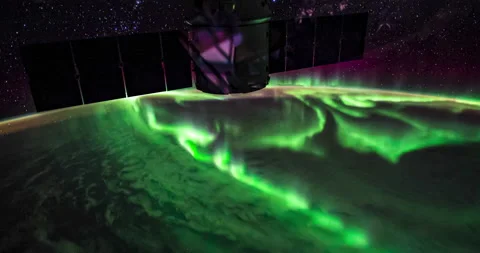 A Stunning Time-lapse of the Aurora Borealis over Earth Stock Footage 130765348
