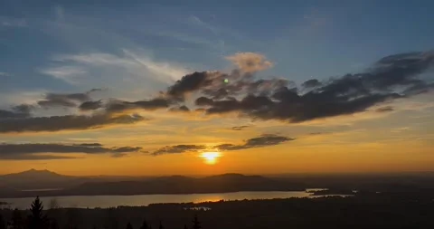 Stunning Time-Lapse of Moving Clouds at Sunset Over Forggensee in Germany 스톡 동영상 240509141