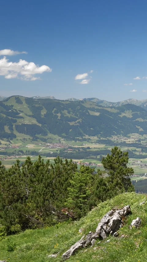 Stunning Timelapse of Alpine Landscapes in Spring with Lush Greenery, Snowy M Stock Footage 309233640
