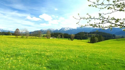 A stunning timelapse of drifting clouds and expansive mountain vistas over th Stock Footage 309185565