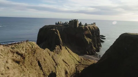 Stunning top down aerial drone shot of Dunnottar castle in Scotland Stock Footage 88825843