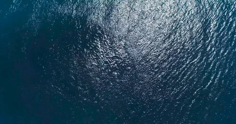Stunning top down Aerial Drone Footage Of Clear Sea Ocean Water With Small Stock Footage 119710902