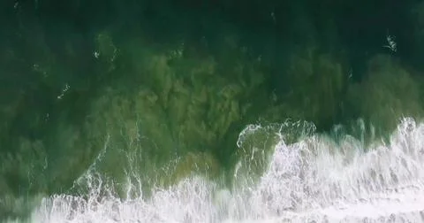 Stunning Top-Down View of Ocean Waves Breaking on a Sandy Beach Stock Photos