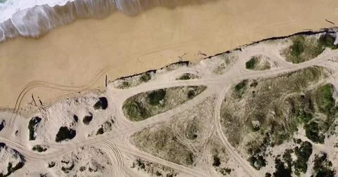 Stunning Top-Down View of Ocean Waves Breaking on a Sandy Beach Stock Photos