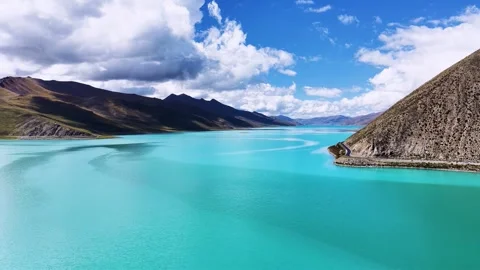 Stunning Turquoise Alpine Lake Surrounded by Majestic Mountains Tibet China Stock Footage 346336707
