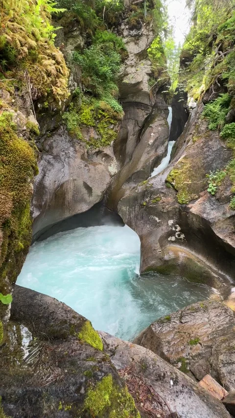 Stunning Turquoise Mountain River Flows Through a Deep Gorge in the Austria.. Stock Footage 332712478