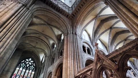 Stunning upward view of Durham cathedral ceiling, featuring ornate arches and Stock Footage 316287956