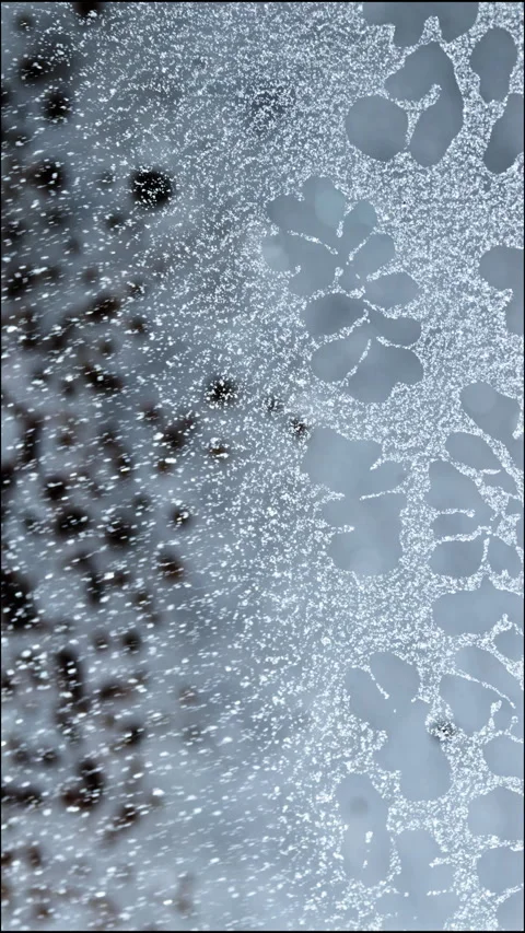 Stunning Vertical Macro of Liquids Interacting in Artistic Flow Stock Footage 328968748