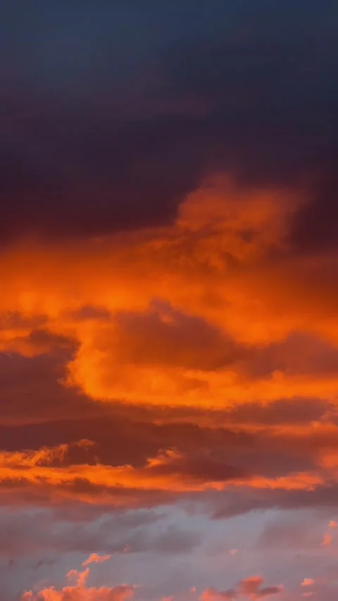 Stunning Vertical Summer Sunset with Fiery Red and Orange Clouds in the Sky Stock-Footage 301910550
