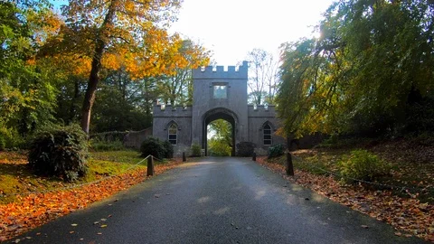 Stunning Video Driving Through Gates onto a Gorgeous Stone Castle Estate Stock Footage 127403899