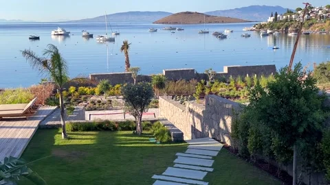 A stunning view of Bitez Bay in Turkey from a luxury resort terrace, with green  Stock Footage 345427418