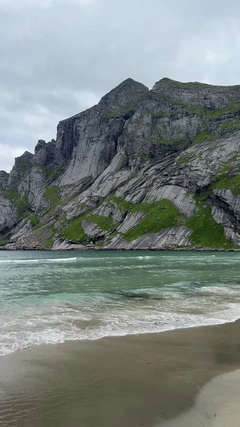 Stunning view of Bunes beach with mountains meeting the Arctic Ocean, Lofoten  Stock Footage 332887237