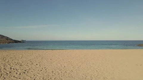 Stunning view of Cala Torta beach in Mallorca with serene blue waters and sandy Stock Footage 302993415