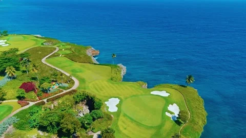 Stunning view of coastal golf course and hotel near the ocean. Stock Footage 282361797