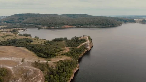 Stunning view of coastline with cliff, forest and rocks. Stock Footage 112578039