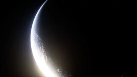 Stunning View of Earth and Crescent Moon from Space Showcasing Planet Curvature 動画素材 297728172