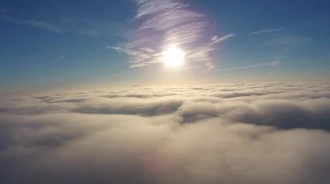 Stunning view flying above the clouds at sunrise Stock Footage 43737159