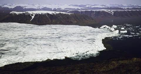 Stunning view of a glacier retreating into the ocean under a clear sky Stock Illustration