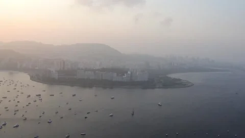 The stunning view of Guanabara Bay, surrounded by mountains, as seen from the su Stock Footage 310230832