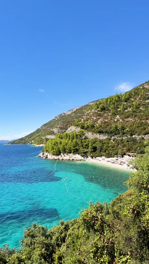 Stunning View of a Hidden Pebble Beach on the Adriatic Coast Stock-Footage 347080363
