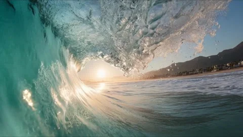 Stunning view from inside a breaking ocean wave sunset 库存影片 339132612