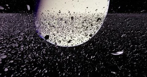 Stunning view of particles in motion against a dark backdrop Illustrazione stock