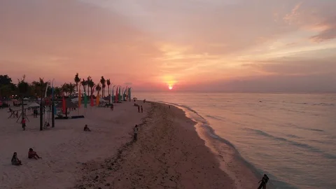 Stunning view of the pink sunset at the beach in Bali. 4K drone footage Stock Footage 122645459