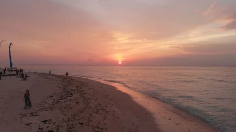 Stunning view of the pink sunset at the beach in Bali. 4K drone footage Stock Footage 123006905