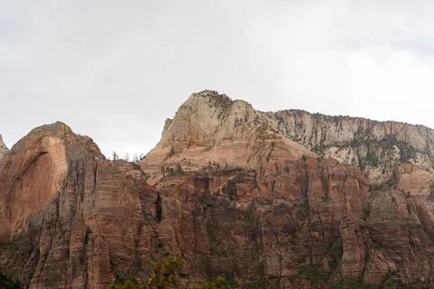 A stunning view of red rocks on a cloudy day at Zion National Park, Utah. Stock Photos