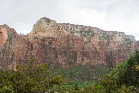 A stunning view of red rocks on a cloudy day at Zion National Park, Utah. Stock Photos