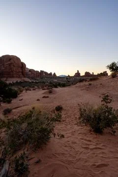 A stunning view of red rocks during golden hour in Arches National Park. Stock Photos