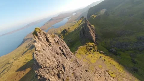A Stunning View of a Rugged Landscape Accompanied by Serene and Ocean Nearby Stock Footage 320789700