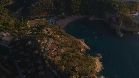 Stunning view of Tossa de Mar, vacation destination, sunset on the beach, 4k Stock Footage 164857190