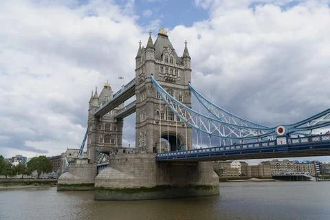 Stunning View of Tower Bridge with Cloud-Filled Blue Sky Stock Photos