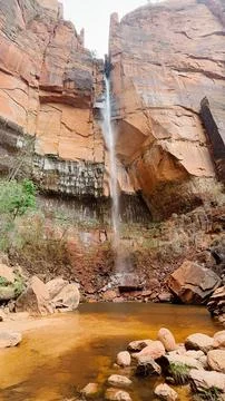 A stunning view of the waterfall at the Lower Emerald Pool in Zion NP, Utah. Stock Photos