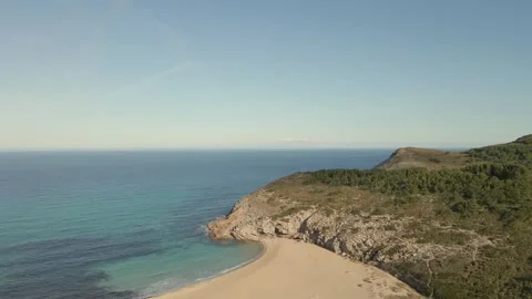 Stunning views of Cala Torta beach in Majorca with clear blue waters and sandy Stock Footage 302993386