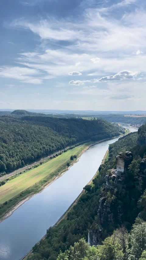 Stunning views of the Elbe River surrounded by green hills Stock Footage 303894422