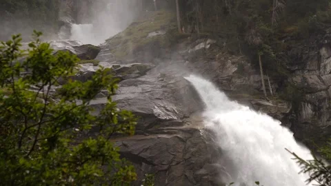 A Stunning Waterfall Gracefully Cascading Through a Lush and Vibrant Forest Stock Footage 292799070