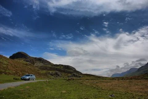Stunning welsh mountains under a cloudy blue sky Stock Photos