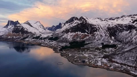Stunning winter landscape over mountains and lake at sunset Stock Footage 320341055