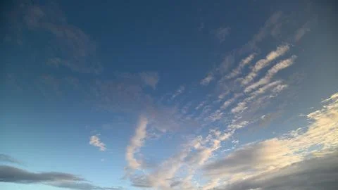 Stunningly Beautiful Cloud Patterns Majestically Set Against a Bright Blue Sky A Stock Photos