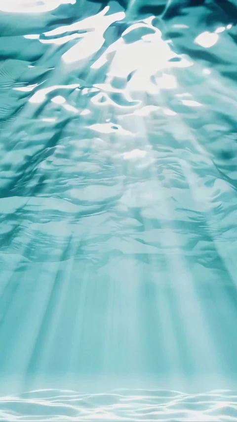 Stunningly Beautiful Light Rays Shine Brilliantly Through the Ocean Water S.. Stock Footage 300724085