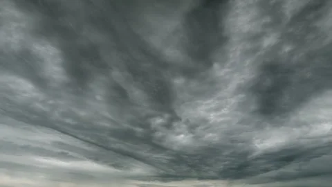 A Stunningly Dramatic Cloudy Sky Captured from Below Providing an Impressive Vie Stock Footage 308693431