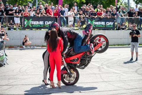 Stunt driver do stunts with hostesses Stock Photos