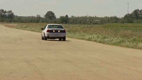 Stunt driver does fast 180 turn  Video stock 76940204