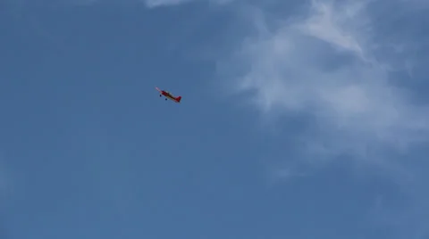 Stunt flyer passing by Stock Footage 26576955