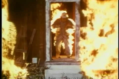 Stunt man on fire during filming of movie scene Stock Footage 25208090