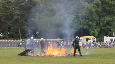 Stunt team pack away fire jump 스톡 동영상 7762415